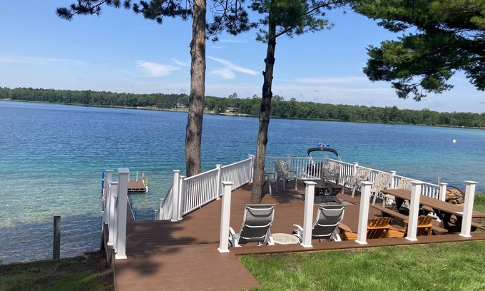 Canada Creek Ranch House | Beautiful Up North Lake Front Home on All Sports Clear Lake with BOAT Rental!