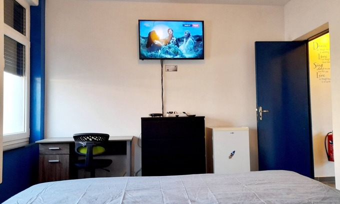 Mons House | Bedroom 1, 12m square with 1 bed 1m80 x 2m with Wifi, TV and fridge