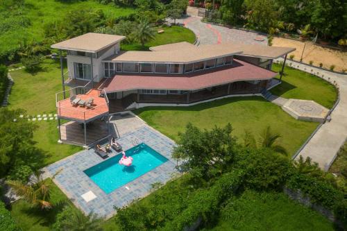 Kadadhe Villa | Bel Air Mansion by StayVista - A tranquil oasis with a spacious deck, Gazebo, Sauna, Jacuzzi & A mini-amphitheatre