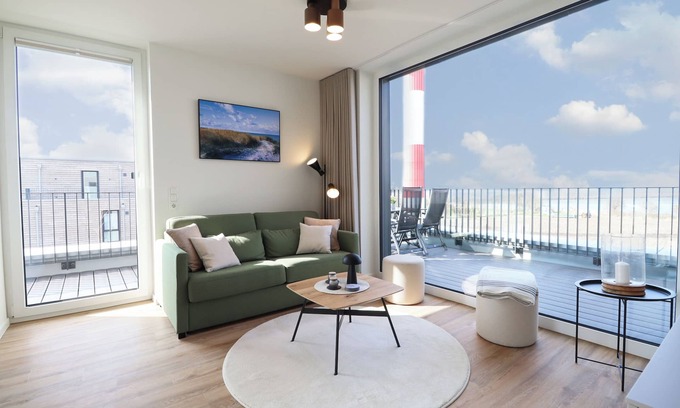 Marienleuchte Apartment | BeltBlick 11 - Roof terrace. Sauna. Pure sea view.