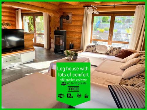 Laslea Apartment | Blockhaus Malmkrog with garden, bright rooms, and an open kitchen