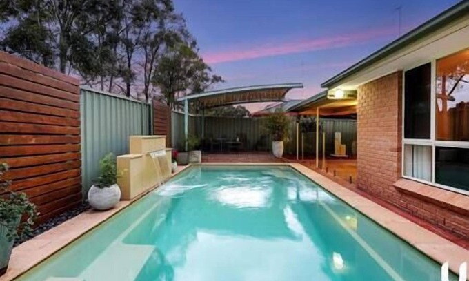 Glenmore Park House | Blue Haven Retreat - Glenmore Park Pool Home