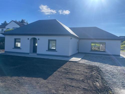 Carraroe House | Blue house, Carraroe