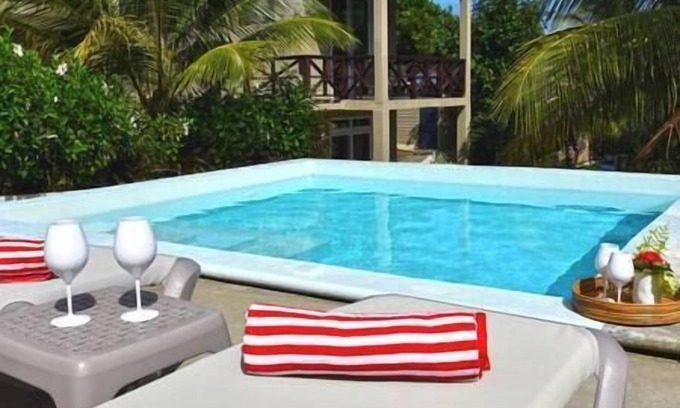 Calibishie Apartment | Bougainvillea Garden Caribbean suite with pool