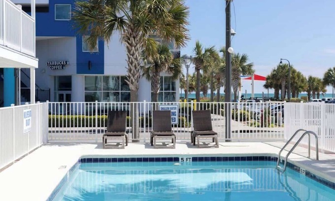 Downtown Myrtle Beach Apartment | Boutique on the beach, Studio #114 + Pool