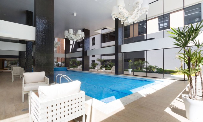 Financial District Apartment | BRAND NEW Great Location 1BDR 1.5BTH WI-FI POOL GYM 24HR GUARD NETFLIX PARKING
