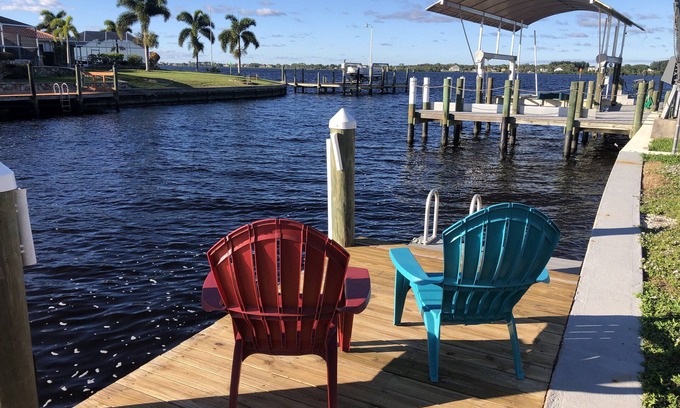 Gulf Cove House | Breath taking canal, pool home with golf access. 15 minutes from beaches.
