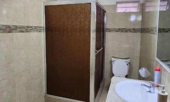 Piarco Apartment | Breezy Bungalow Airport Suite