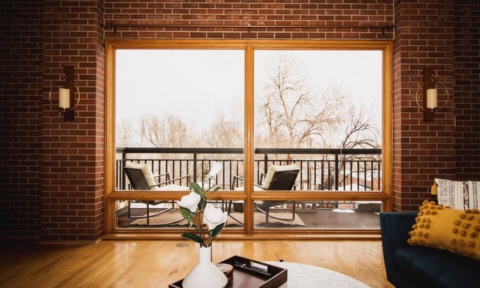 Greeley Apartment | Brick & Balcony Greeley Retreat