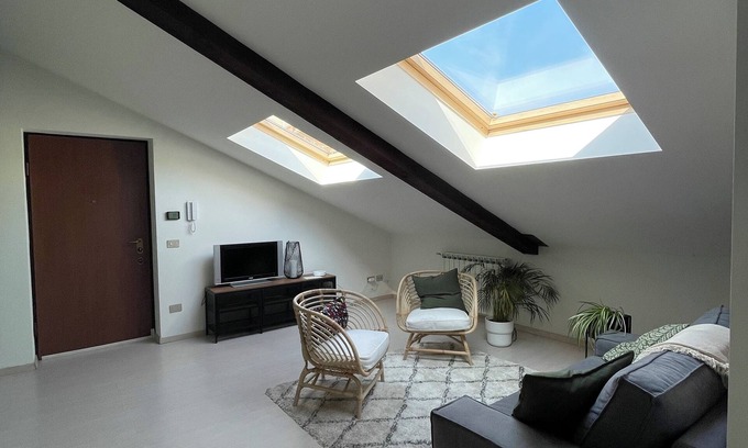 Asti Apartment | Bright attic apartment with balcony in the center of Asti