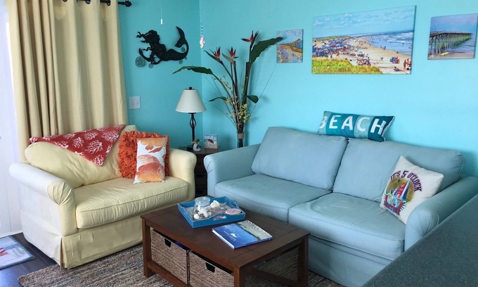 North Carolina Coast Condo | Bright end unit, Ocean Views, 1st floor, Pool, Double Decks, Keyless Entry