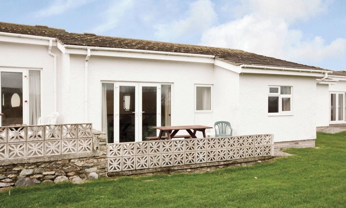 Trearddur Bay Cottage | Bungalow with one double with wash basin, one double and one twin.