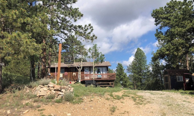 Bailey Cabin | Cabin on a mountain in a forest
