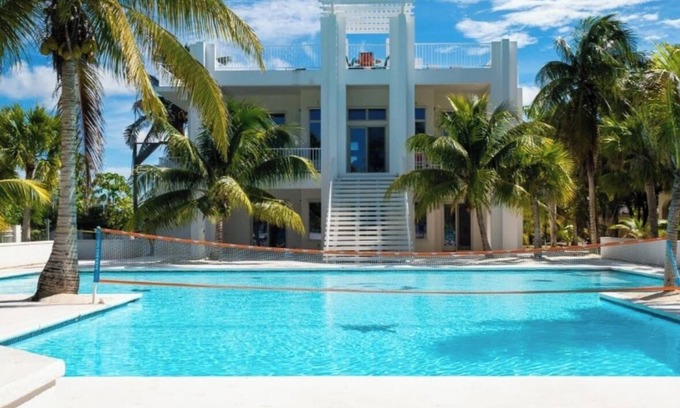 Sandy Point House | Calm Waters - A Luxury Beachfront Private Villa. No Crowds. Just Ocean.