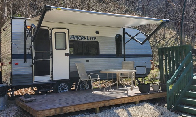Decorah House | Camper next to a waterfall!