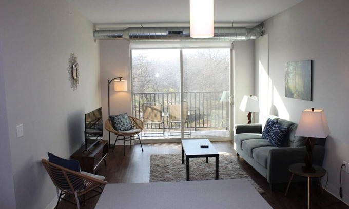 Ames Apartment | Campustown Flat near Jack Trice with Firepit