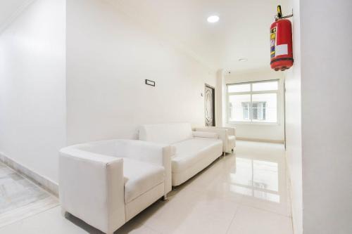 Guntur Hotel | Capital O Aditya Grand
