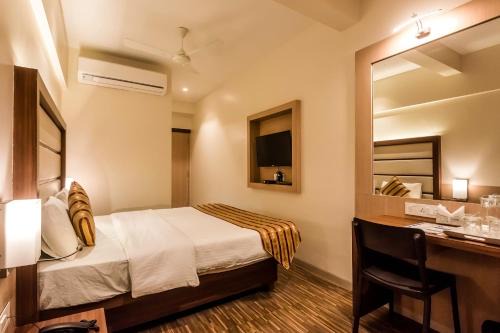 Kopar Khairane Hotel | Capital O Hotel Konar Inn