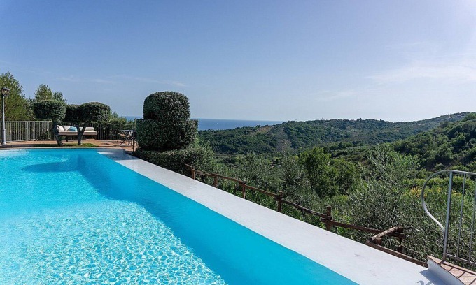 Casal Velino House | Casa Rosamunda A: A graceful apartment that is part of a villa surrounded by the greenery, with Free WI-FI.