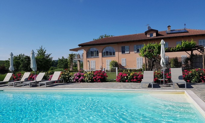 Castiglione Tinella Apartment | Cascina del Noce - Alba. Spacious apartment with exceptional views and pool