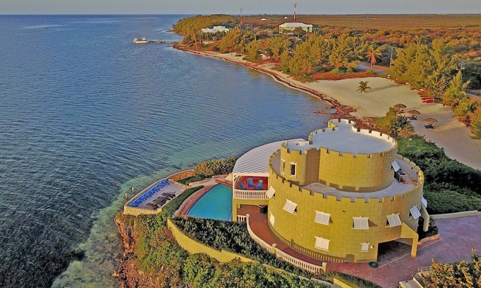 Gun Bay House | Cayman Castle: Gated Family Estate w/Infinity Pool, Private Beach, Free Kayaks
