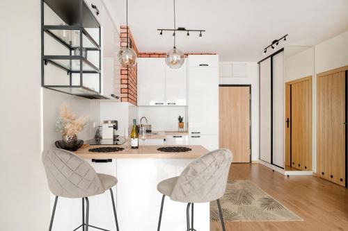 Baluty Apartment | Central Manufaktura Apartment - Parking, Balcony - by Rentujemy