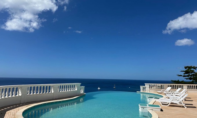 Giraudel Apartment | Centrally located apartment in a quiet community with exceptional views!