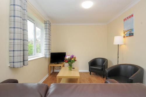 Brixham House | Chalet 11 at Landscove Holiday Park