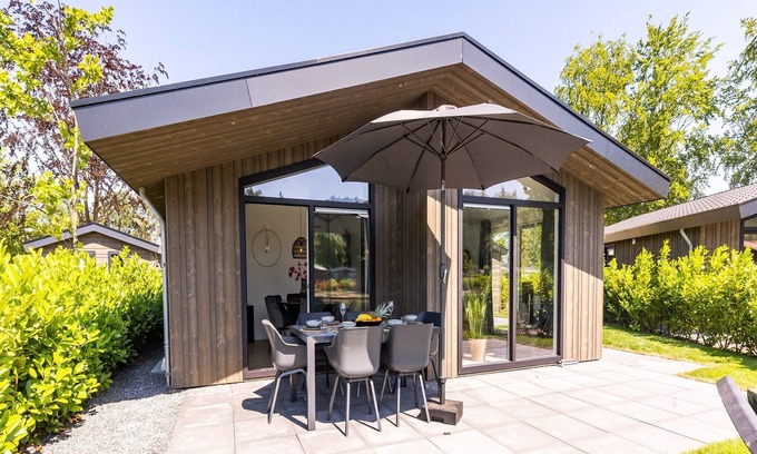 Municipality of Veldhoven Ski Chalet | Chalet by Pond with Sauna
