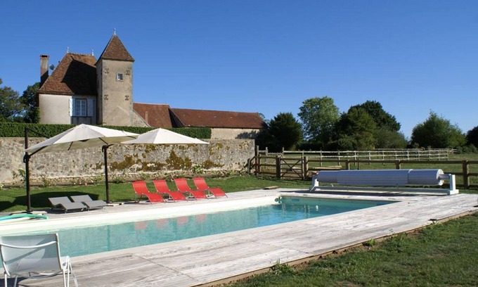 Le Brethon Cottage | Charming 15th-Century House with Pool, Garden, and Family Amenities Near Tronçais Forest