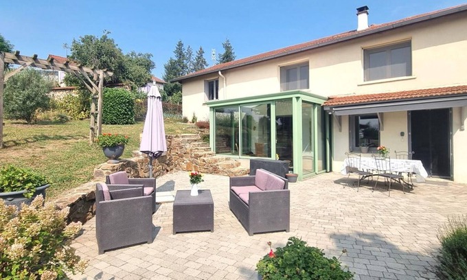 Saint-Galmier Cottage | Charming 3-Bedroom Cottage with Garden, Veranda, and Outdoor Games in Saint-Galmier