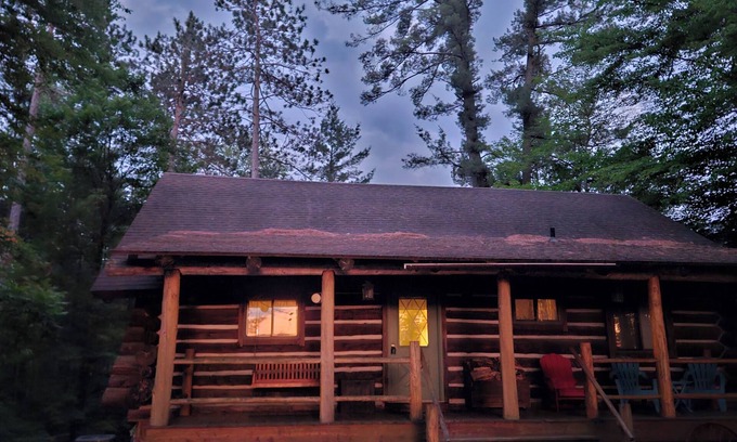 Wauksaukee Cabin | Charming 4+ bedroom log cabin among beautiful tall pines on a small trout stream