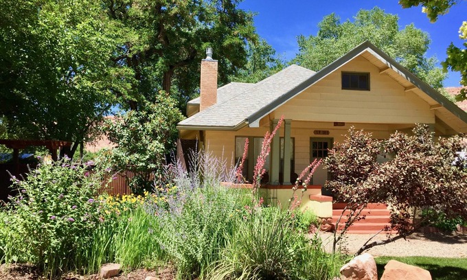 Moab Cottage | Charming cottage off Main Street. Cool summer gardens. Warm winter fireplace