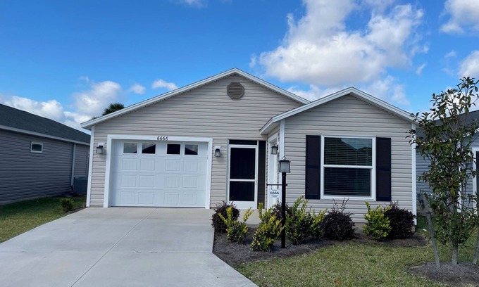 Okahumpka House | Charming home w/spacious kitchen, water view, enclosed lanai, & Pet Friendly