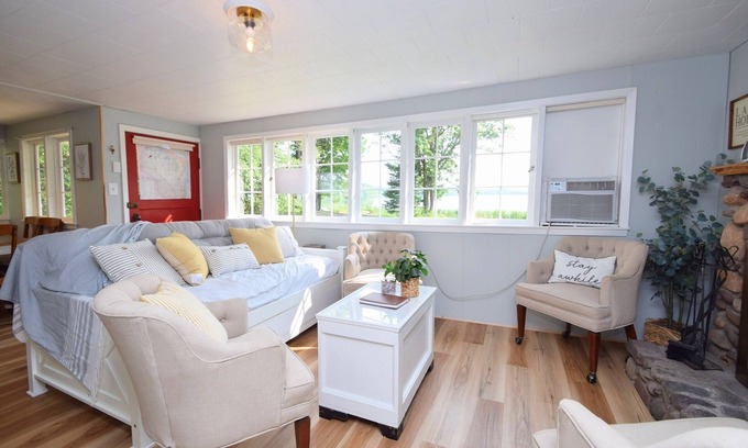 Webster Cottage | Charming Lakeside Cottage nestled on 40 private, wooded acres on Big Sand Lake
