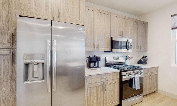 Santa Clara House | Charming townhouse with mountain view, heated pool, central AC, & W/D