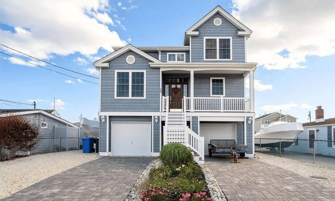 Beach Haven West House | Charming Waterfront 4-bedroom house - Boat & 2 Jetski docks, hot tub and more!