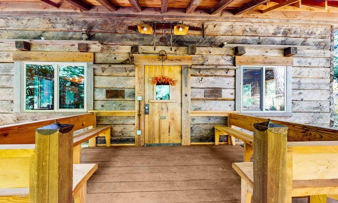Clinton House | Charming woodland cottage with 2 covered porches, wood stove, treehouse, firepit
