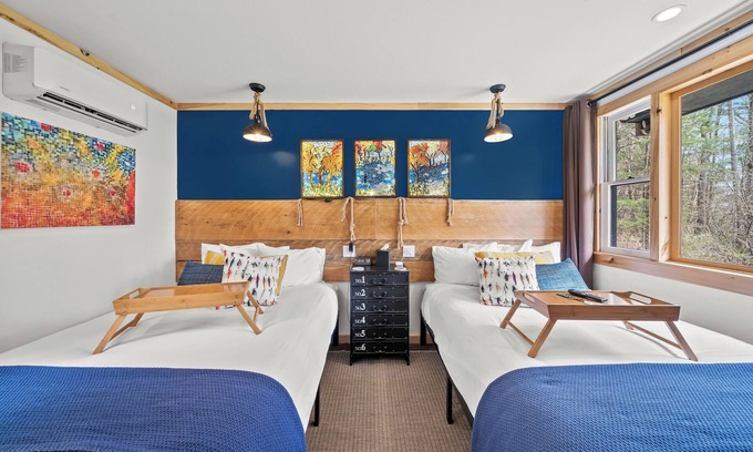 Hancock Hotel | Cheerful Woodland Haven | Bright Double Room with Artistic Flair & Natural Wood Accents