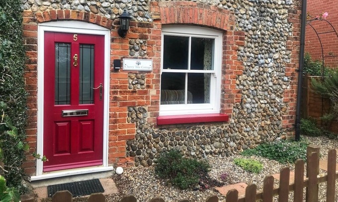 Briston House | Cherry Tree Cottage is set is in the idyllic village of Briston.