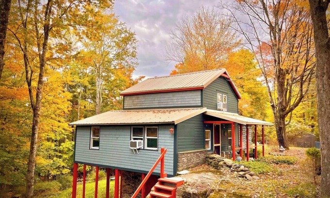 Smallwood Cabin | Chic Treehouse Cabin with Pedal Boat, Hot Tub, BBQ, Fire Pit, SUPs, & Lake Access