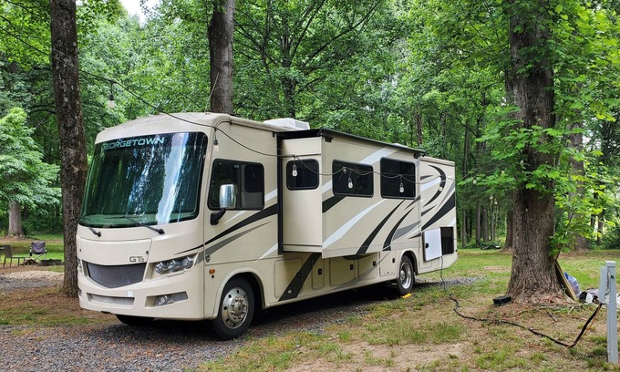 Clifton House | Class A RV on a private 5 Acre Property with RV campsite and trail.