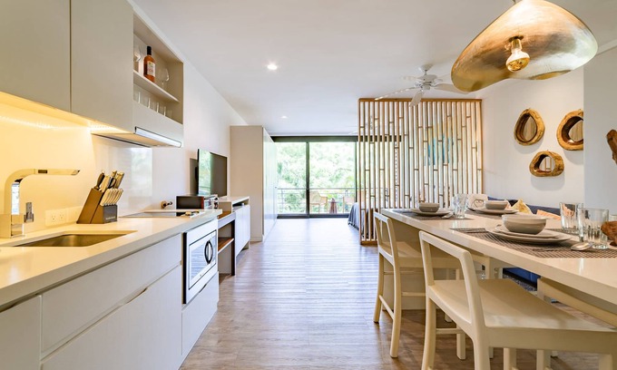R Condo | Close to Town and Beach | Studio with Private Terrace in Mixie Condos