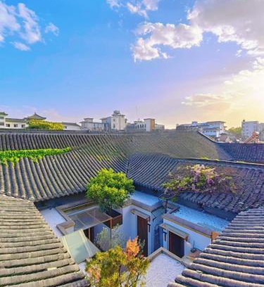 Guangling Qu House | cloud and wind