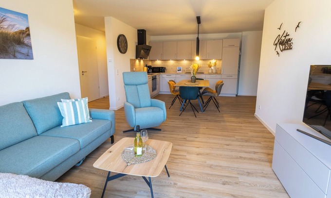 Tossens Apartment | Coastal love - enjoy the North Sea air. Sauna. Roof terrace. Family time.