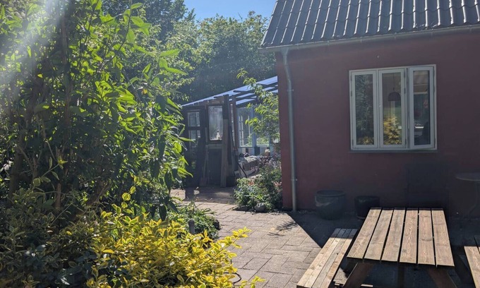Hesselager House | Colorful home on a natural plot with its own small forest
