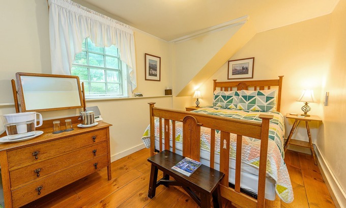 Stowe Bed & Breakfast | Comfortable budget room with queen bed, street view, and all-glass shower stall with full service breakfast included