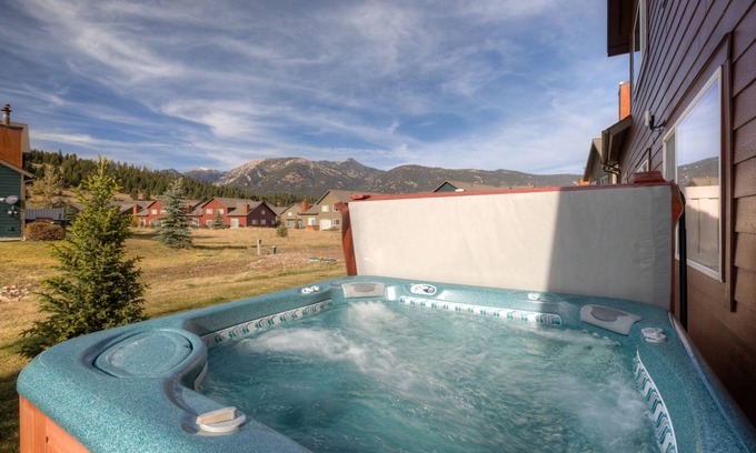 Big Sky House | Condo w/private hot tub close to Town Center & Big Sky Resort - The Hallmark Chalet