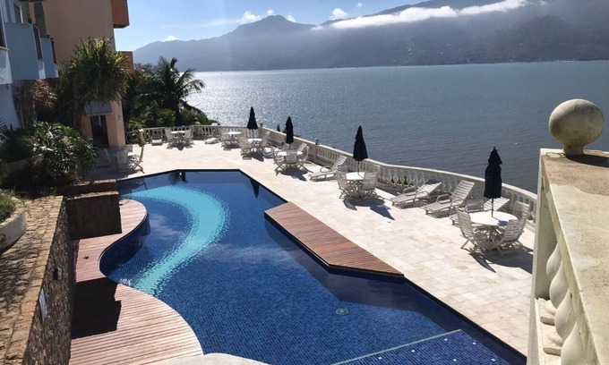 Pontal da Cruz Apartment | Condomínio com ótima estrutura e vista privelegiada.