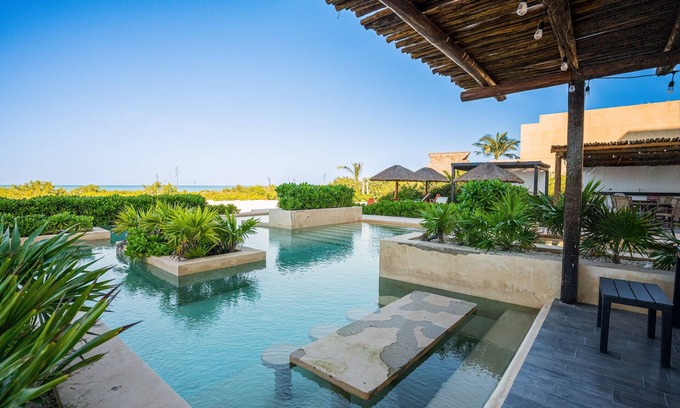 Miramar Apartment | Contemporary beachfront apartment with pool, gym, ocean views, and balcony space